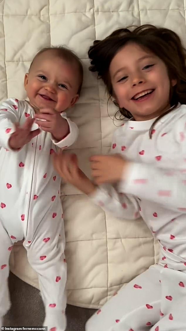 She included sweet moments of Sunday, six, with her baby sister
