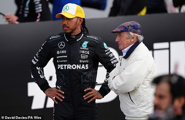 It is the first time that Hamilton (seen speaking to Sir Jackie Stewart) has qualified on the front row this season