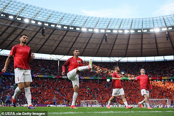 BERLIN, GERMANY - JULY 06: Players of Turkiye warm up prior to the UEFA EURO 2024 quarter-final match between Netherlands and TÃ¼rkiye at Olympiastadion on July 06, 2024 in Berlin, Germany. (Photo by Alex Pantling - UEFA/UEFA via Getty Images)