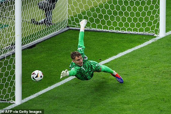 Netherlands' goalkeeper #01 Bart Verbruggen tries to make a save as the ball touches the  post during the UEFA Euro 2024 quarter-final football match between the Netherlands and Turkey at the Olympiastadion Berlin in Berlin on July 6, 2024. (Photo by Ronny HARTMANN / AFP) (Photo by RONNY HARTMANN/AFP via Getty Images)