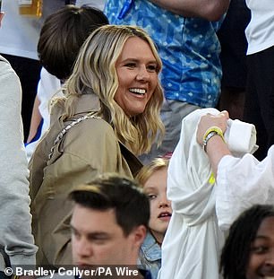 Katie couldn't wipe the huge smile off her face as she chatted with the players