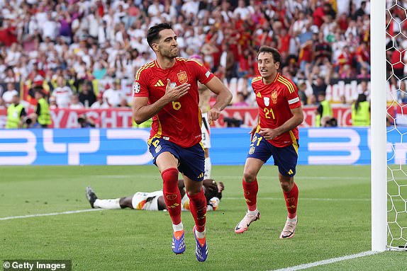 STUTTGART, GERMANY - JULY 05: Mikel Merino of Spain celebrates scoring his team's second goal during the UEFA EURO 2024 quarter-final match between Spain and Germany at Stuttgart Arena on July 05, 2024 in Stuttgart, Germany. (Photo by Alex Livesey/Getty Images)