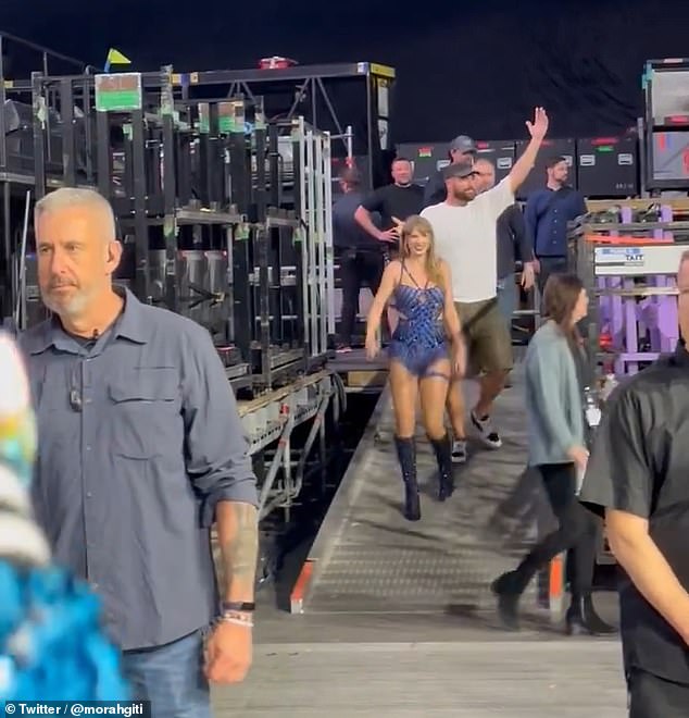 Travis Kelce and Taylor Swift were greeted by huge cheers as they left stage in Amsterdam