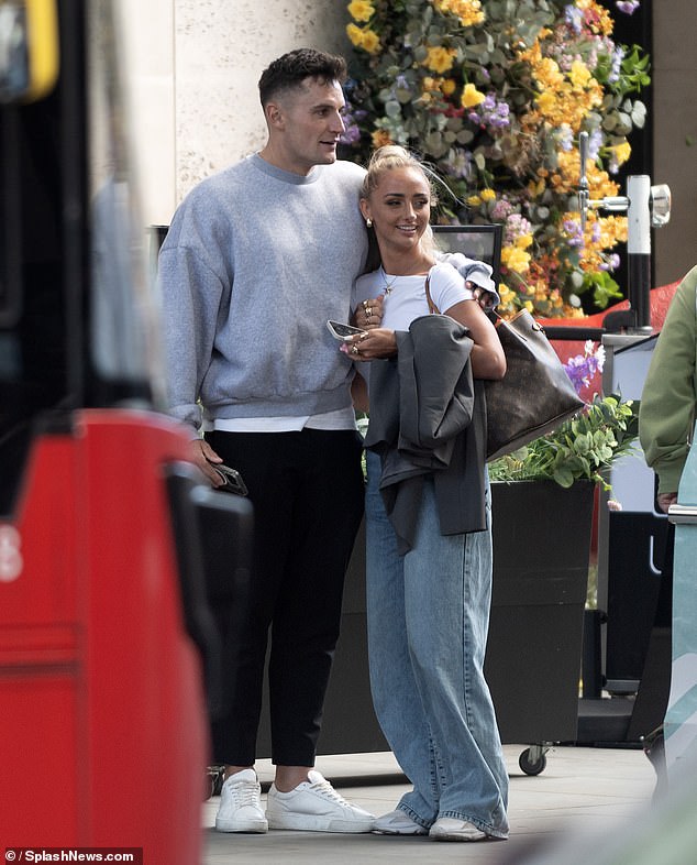 Abi Moores has sparked romance rumours after she was seen cosying up to Australian series winner Mitchell Hibberd on Saturday in central London