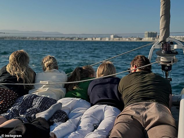 The former couple, who were married from 2001 to 2013, laid down with their girls to take in the the incredible view