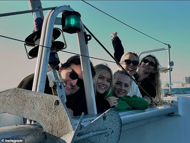 Peter Facinelli (left) reunited with ex-wife Jennie Garth (second right) for a fun 'Family Day Out' together on a boat with their three daughters Fiona, 17, Lola, 21, and Luca, 27