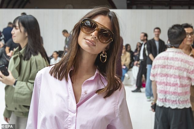 Commenting on the hard launch post, fans were quick to point out the brunette beauty was the spitting image of American supermodel Emily Ratajkowski (pictured)