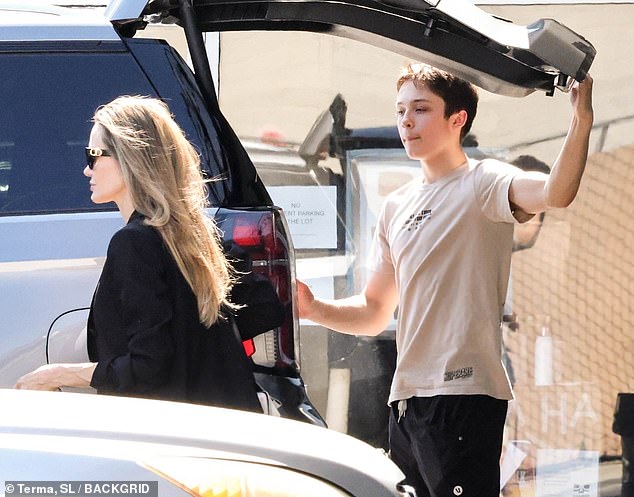 The 49-year-old Oscar winner  was spotted on the rare outing with the teen in the tony Los Angeles neighborhood of Los Feliz