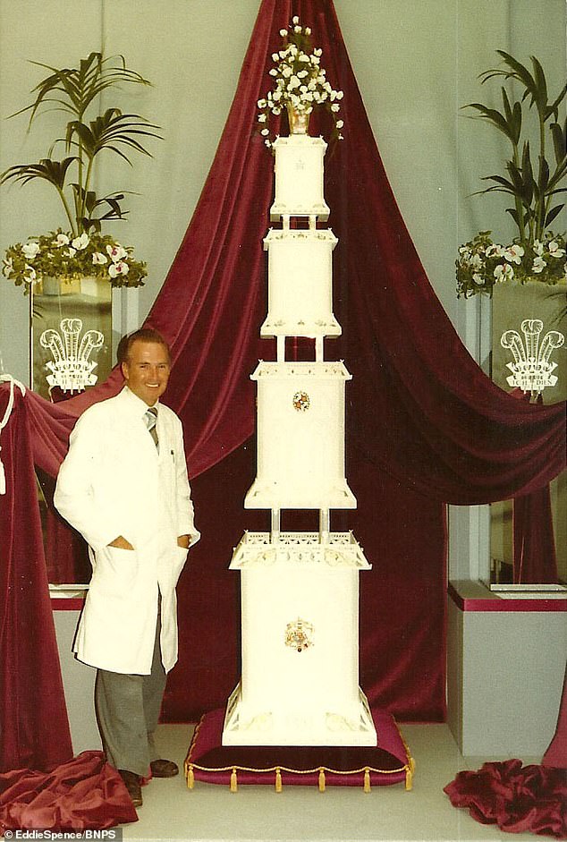 Eddie Spence standing next to his creation of Charles and Diana's wedding cake