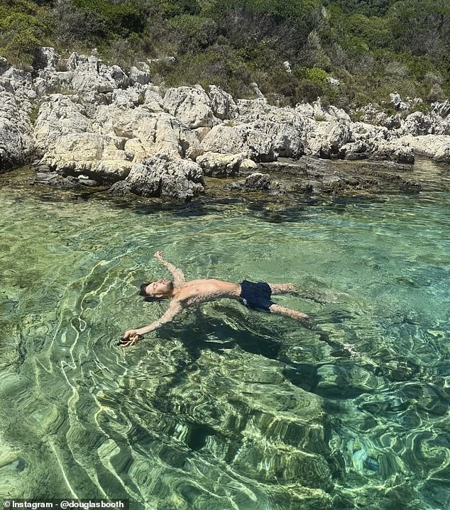 Douglas floated on his back as in crystal blue waters in one snap, and captioned his post: 'GR Paxos we [heart emoji] you GR'