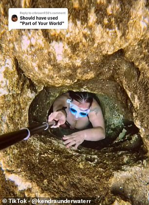 Incredible footage shows freediver Kendra Vandergrift squeezing through terrifying small holes