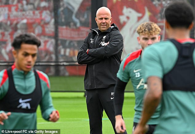 Liverpool head coach Arne Slot watches on as Liverpool players train at AXA Training Centre