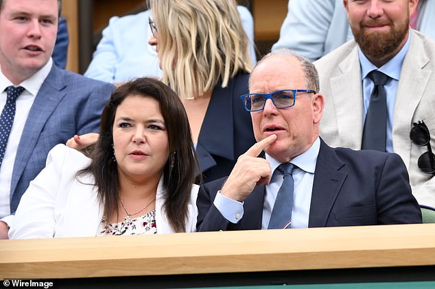 Melanie Antoinette de Massy and Albert II, Prince of Monaco attend day eight of the Wimbledon Tennis Championships