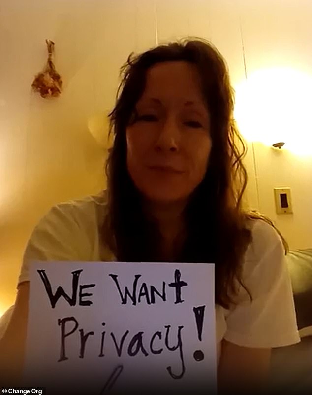 A signer named Shawnia held a sign that read, 'We want privacy!' as she said: 'We all know you're trying to fix your PR, Harry. We'll give you your privacy'