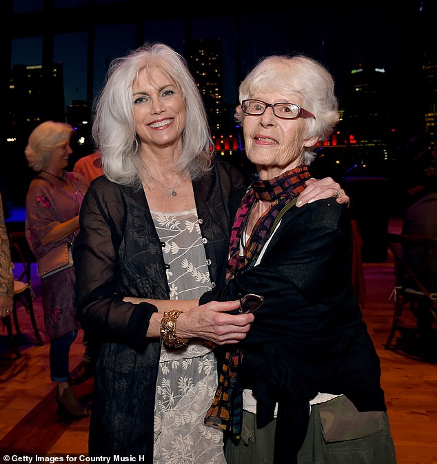 The pair are pictured together again in Nashville in 2018, for Emmylou's exhibition debut at Country Music Hall of Fame and Museum