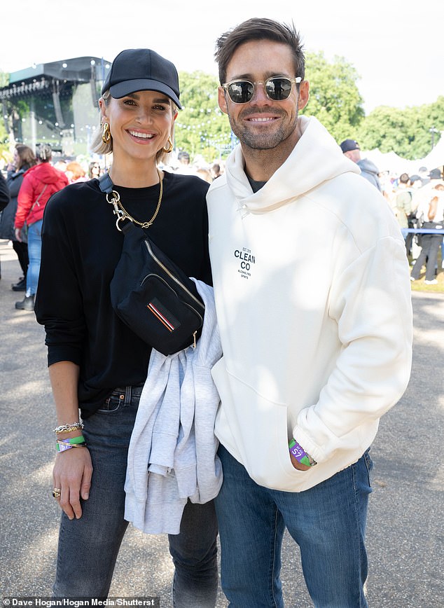 The pair cut casual figures at the event and flashed huge smiles