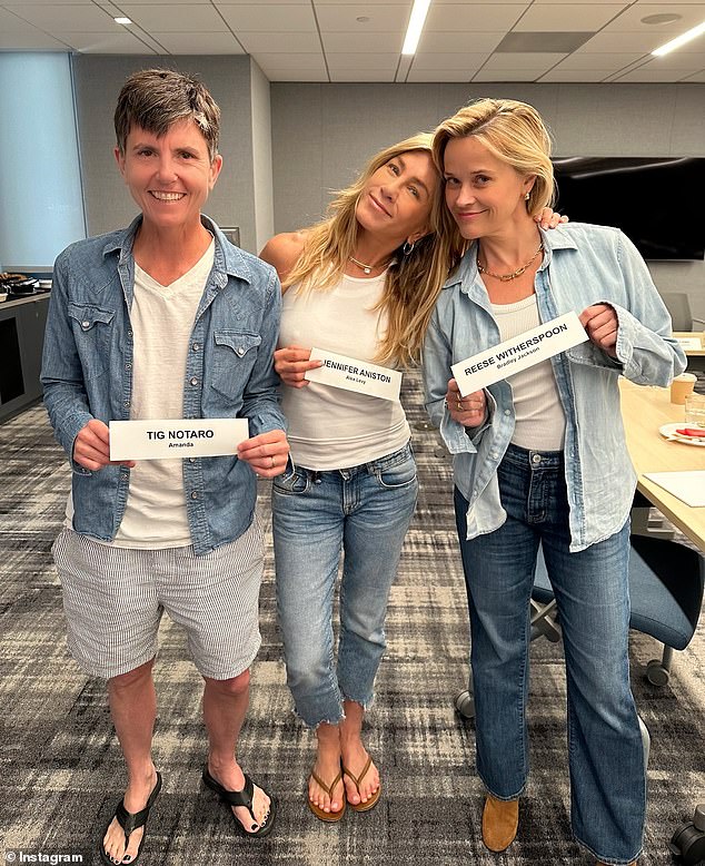 Aniston was alerting her Instagram followers she was back at work. She, Reese and Tig Notaro were on the set of season four of their hit Apple TV+ series The Morning Show. 'Let @themorningshow season 4 games begin, Here we come!' wrote Aniston as she added two red heart emojis