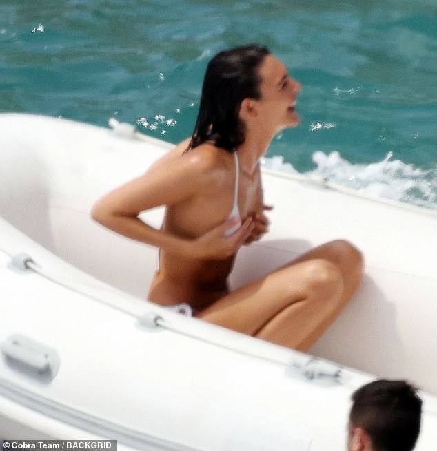 Vittoria was forced to grab her bikini top in a vid to avoid a wardrobe malfunction