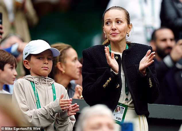 The tennis star's wife Jelena Djokovic looked slightly uncomfortable as Djokovic took on the crowd