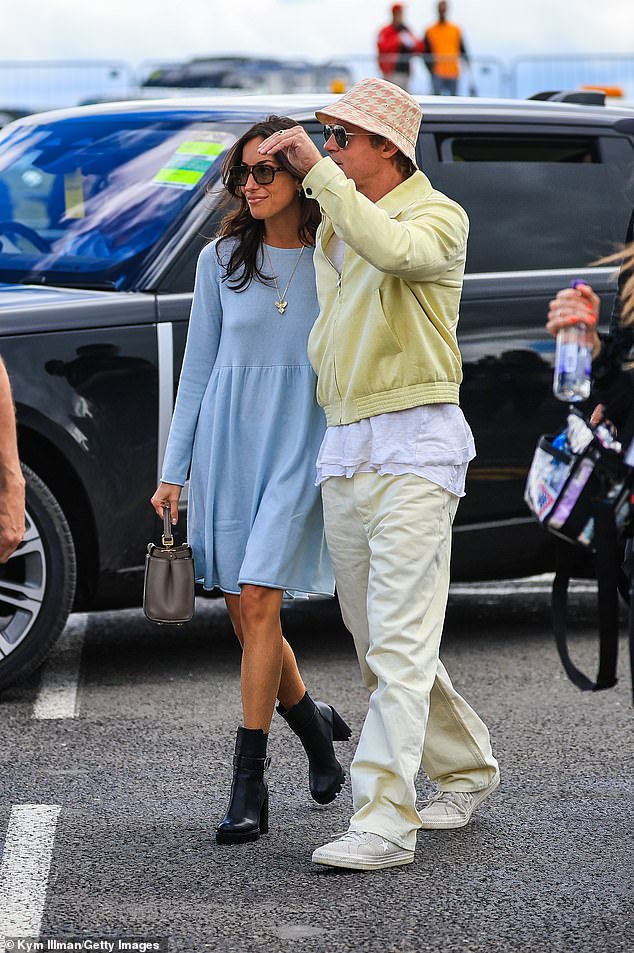 Brad Pitt is 'still very happy with' his much younger girlfriend Inés-Olivia de Ramon, whom he publicly held hands with as they arrived to the British Grand Prix in Northampton, England on Sunday