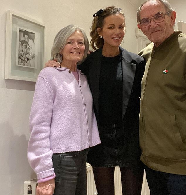 Kate's stepdad Roy Battersby died in January following a 'brief illness' after being diagnosed with two forms of cancer the summer before (pictured left with her mother Judy right)