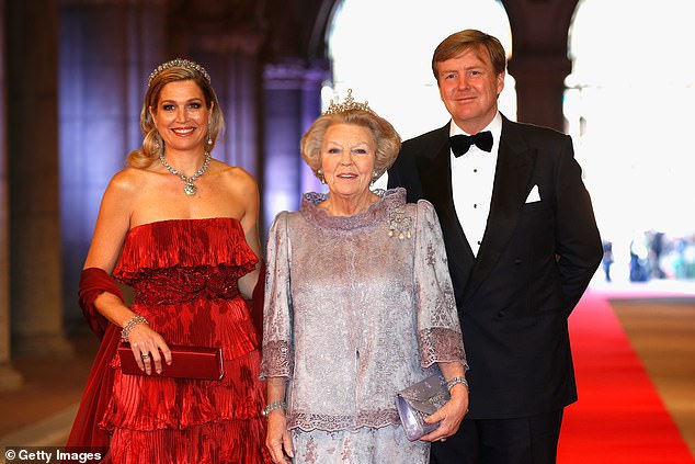 Queen Beatrix reigned from 1980 until 2013, when she gave the throne to her son, Willem-Alexander, the current King. Above: Queen Beatrix with her Willem and his wife Maxima ahead of her abdication, 2013