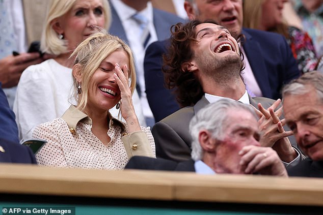 Sienna Miller and her boyfriend Oli Green put on a giddy display as they led the stars in the Royal Box at the All England Lawn Tennis and Croquet Club for the Wimbledon Championships on Tuesday afternoon