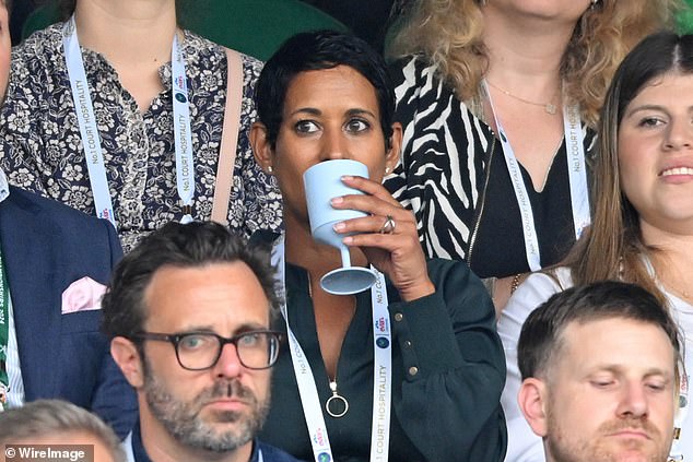 Naga Munchetty sipped on her drink while watching the game