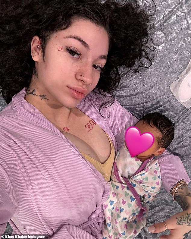 Danielle, who announced she had given birth on March 15, could be seen resting in bed with the newborn cradled in her arm