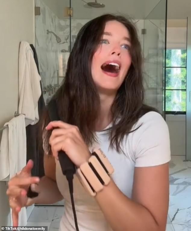 Model and content creator Emily DiDonato took to TikTok this week to try out the hack, which involed getting ready while wearing a set of two-pound wrist weights