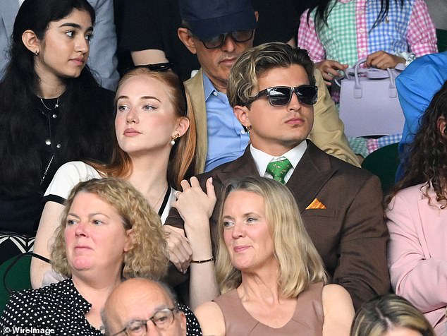 Lauren and Nikita's faces were tense as they observed the action on Centre Court