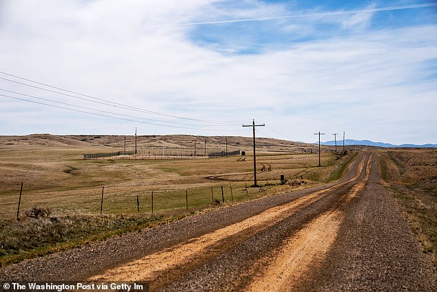 Montana local Ross Butcher grew up on a Fergus County ranch (pictured) with an underground nuclear Minuteman missile silo installed by the Air Force in a small fenced enclosure (top left)