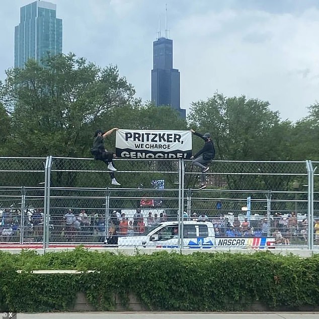 They also flew a flag much more aimed at Illinois Governor J.B. Pritzker, accusing him of being complicit in the 'genocide' of Palestinians by Israeli forces