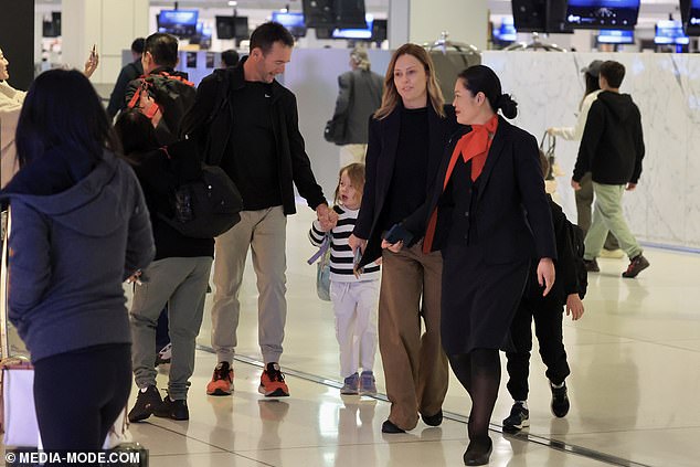 The family was also escorted to the gate by Qantas ground staff, a service usually only provided to business or first class passengers