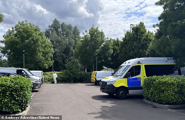 Police are pictured at the scene in Andover following the discovery of Mr Crocker's body in June last year