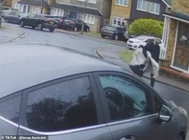 Doorbell footage shows a man believed to be Kyle Clifford walking away from a house containing the dead bodies of his ex-girlfriend, her mother and her sister in Bushey yesterday evening. He is allegedly seen with what appears to be the crossbow he allegedly used in the attack