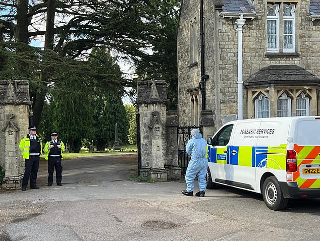 Forensics were seen outside Lavender Hill Cemetery in Enfield as the manhunt for Kyle Clifford continued