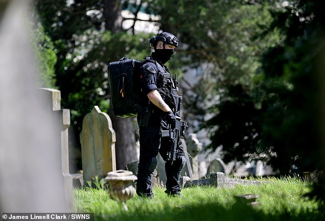 Armed police searching Lavender Hill cemetery in Enfield as the hunt for fugitive Kyle Clifford took a new turn