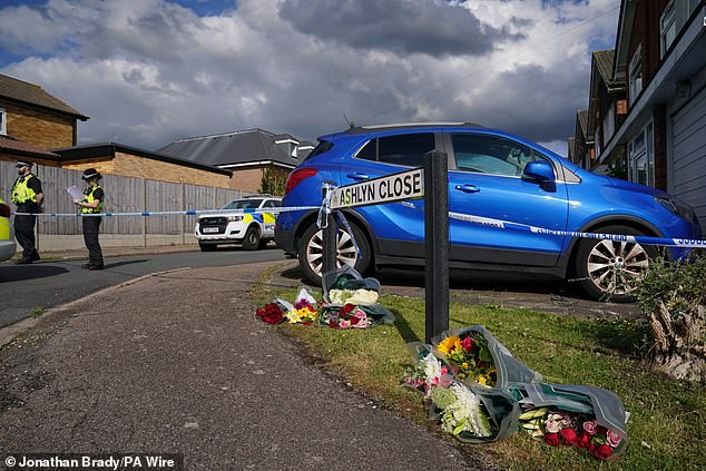 A view of the scene in Hertfordshire where the wife and two daughters of a BBC sports commentator have been killed at their home