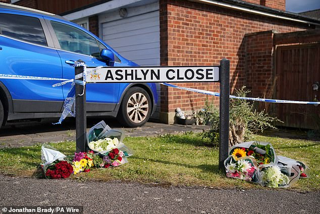 A view of the scene in Bushey where the wife and two daughters of a BBC sports commentator have been killed