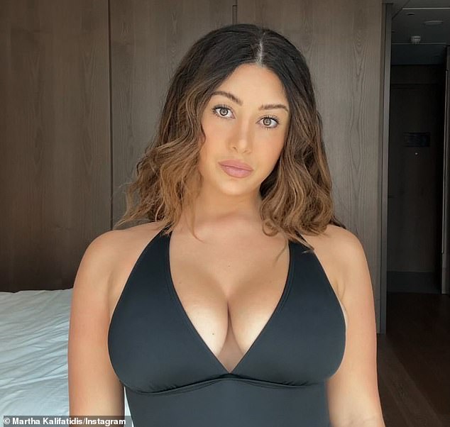 Martha admitted she regretted getting her breast implants 15 years ago and wishes she had got them taken out years ago (she is pictured with the implants)