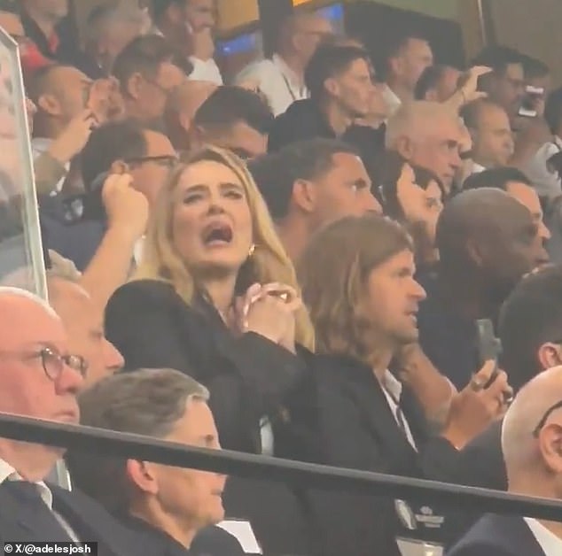 Football fan Adele was seen passionately yelling at England's rowdy crowd to 'shut up!' just before Harry Kane took his penalty during the Three Lions' Euros semi-final on Wednesday