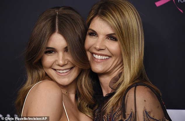 'An obvious example of helicopter or Snowplow parenting is Lori Loughlin, who resorted to bribery in her daughter¿s college admissions process,' Dr Woo told DailyMail.com. Loughlin is pictured here in 2018 with daughter Olivia Jade Giannulli