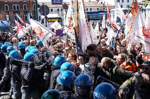 Venice, seen above, now charges an entry fee of ¿5 (£4.23/$5.43) for day-trippers during the busiest periods, but locals and officials have clashed, with residents claiming the fee is turning the city into a theme park