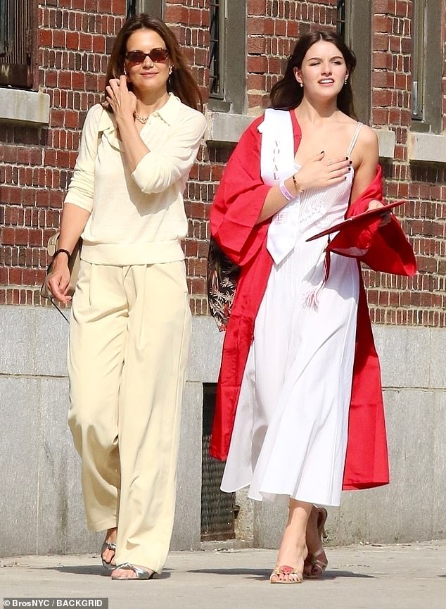 Suri Cruise has a 'non-existent' relationship with her father Tom Cruise's adopted children, Connor and Isabella (pictured with mom Katie Holmes)