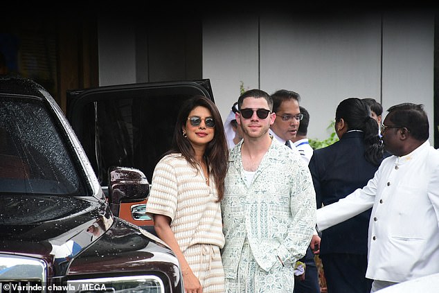 Nick further accessorised his look with a pair of black shades