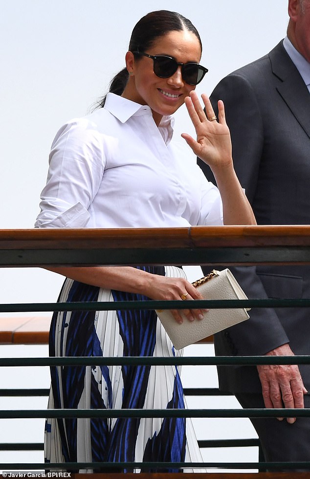 Pictured: Meghan Markle seen arriving at Wimbledon before she stepped down as a senior working royal