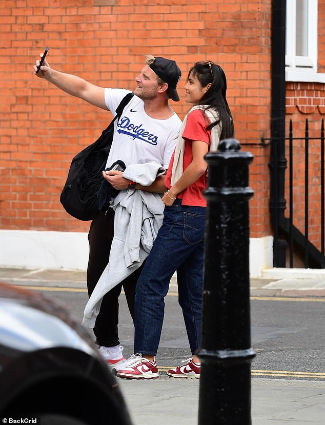 Emma was seen checking her phone as she went for a stroll with Fran and she also posed for snaps with fans who spotted her.