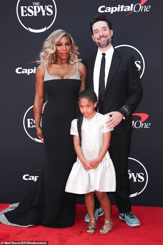 Her husband Ohanian - co-founder of Reddit - opted for a classic black Gucci suit with a white dress shirt and black tie.