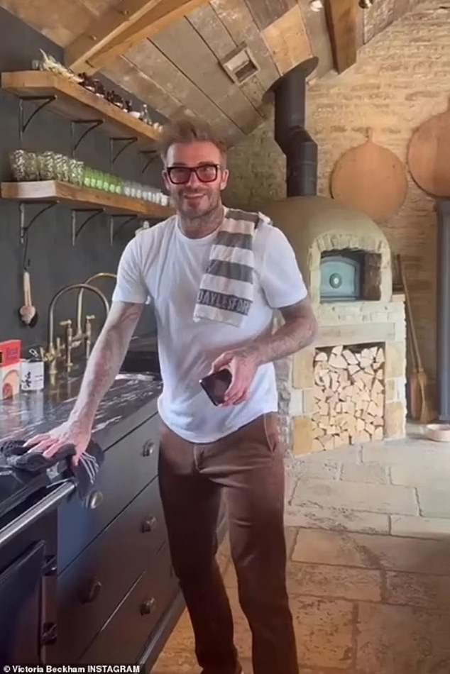 The Beckhams' rustic Cotswolds kitchen is complete with a huge pizza oven, an aga and designer tea towels